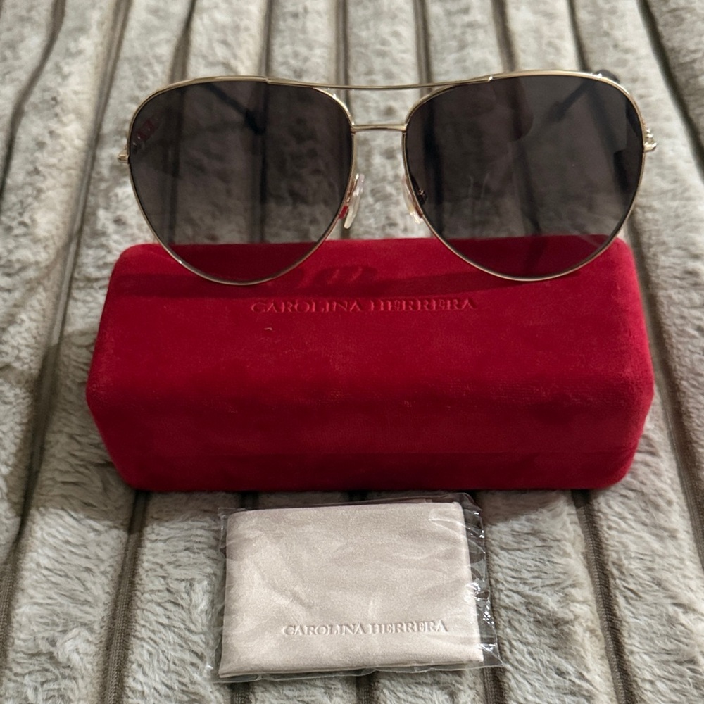 Carolina Herrera Gold Aviator Sunglasses with Dark Gray Lenses